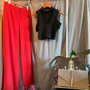 Red wide leg trouser BCBG with side slit size 2
Can be paired with any top